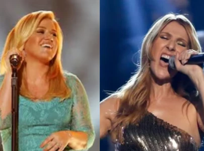kelly clarkson overwhelmed with emotion after c line dion s performance