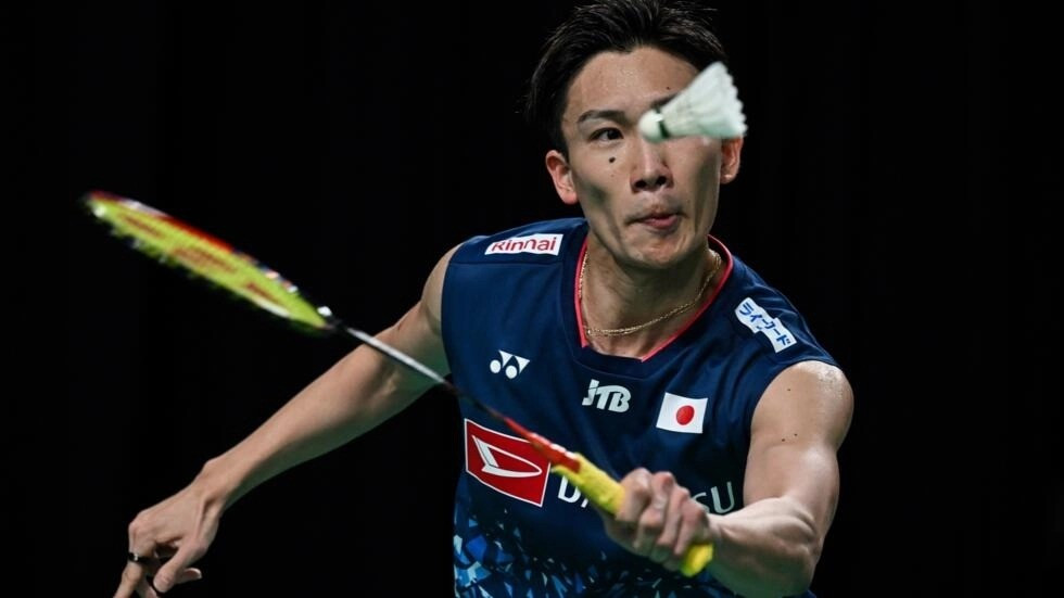 grit japan s kento momota in action in february he picked himself up in the aftermath of a serious accident he met with just hours after the malaysia masters win in 2020 photo afp