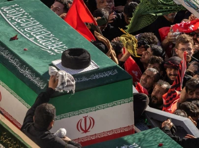 people seek revenge as crowds lay khamenei to rest