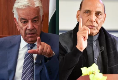 defence minister khawaja asif and his indian counterpart rajnath singh in a combined photo display photo afp file