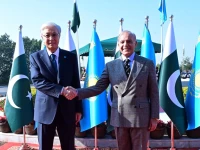 president of kazakhstan kassym jomart tokayev shaking hands with prime minister shehbaz sharif at the prime minister house photo pid