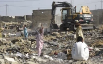 karachi s decades old afghan camp emptied as land mafias clash with police karachi s decades old afghan camp emptied as land mafias clash with police