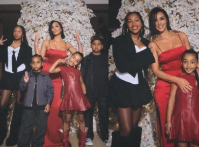 kim kardashian and kanye west s children steal the spotlight in festive holiday photos
