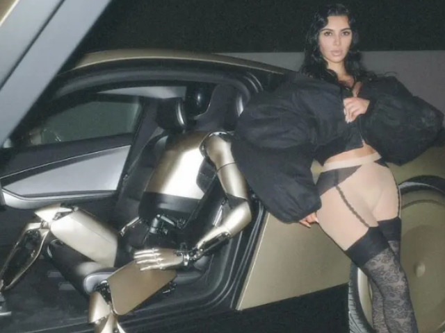 kim kardashian denies claims of payment for posing with 30k tesla robot in controversial shoot kim kardashian denies claims of payment for posing with 30k tesla robot in controversial shoot