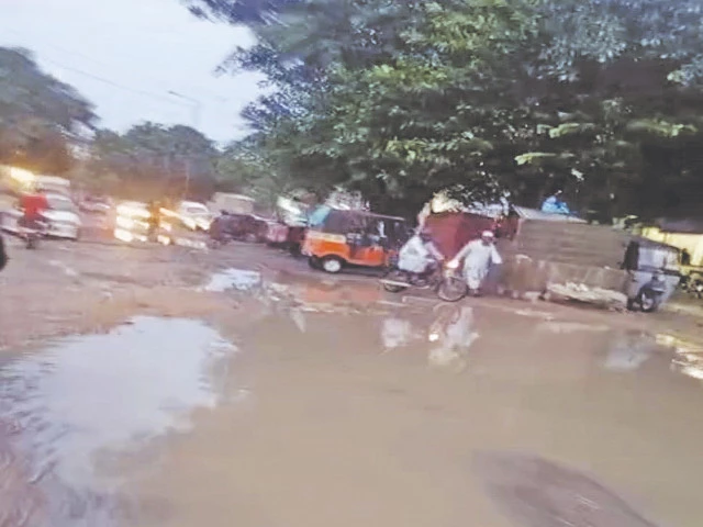 once vibrant gulshan streets are now drowned in despair as rainwater and sewage converge leaving residents to navigate a sea of neglect photo express once vibrant gulshan streets are now drowned in despair as rainwater and sewage converge leaving residents to navigate a sea of neglect photo express