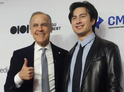 canada s pm mark carney is all praise for heated rivalry as hudson williams presents him the viral fleece