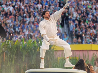 bad bunny s super bowl halftime show breaks records sparks cultural debate