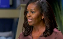 michelle obama reveals she got 10 piercings in one sitting