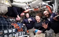 brian may reacts as queen s under pressure wakes artemis ii astronauts in space