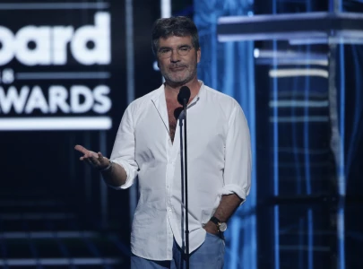 simon cowell surprises school choir with shock britain s got talent audition reveal