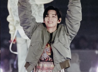 bts v says layover helped him show his different vibrant colours as a solo artist