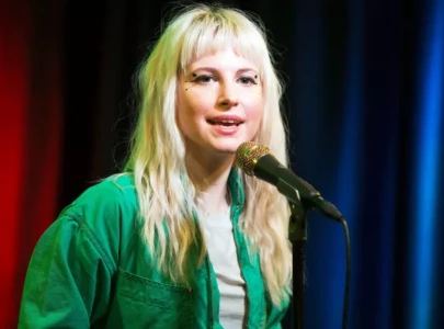 hayley williams shouts f ice and free palestine on stage during concert