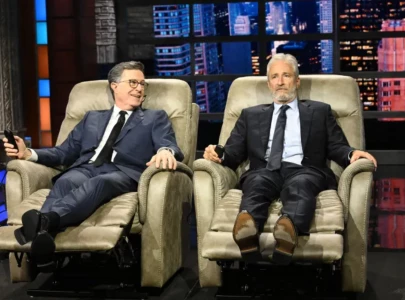 jon stewart surprises stephen colbert with recliners andra day ahead of the late show finale
