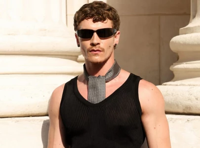 connor storrie turns heads at paris fashion week with striking ysl look