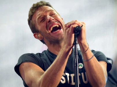 chris martin s unreleased james bond theme song heads to auction after 27 years chris martin s unreleased james bond theme song heads to auction after 27 years