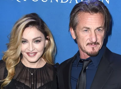 madonna sparks sean penn speculation with cryptic lyrics in new song bizarre