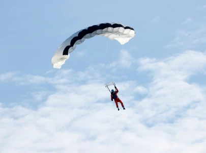 parachutist has rough landing after getting caught by a wire during armed forces bowl pre game parachutist has rough landing after getting caught by a wire during armed forces bowl pre game