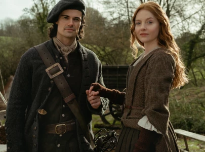 outlander blood of my blood season 2 trailer teases more romance danger and time travelling drama