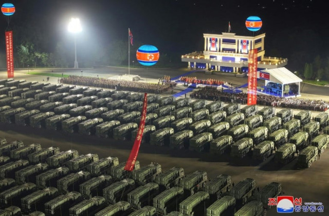 a photo released by north korean state media shows what are reportedly ballistic missile launchers being sent to troops on the border photo afp a photo released by north korean state media shows what are reportedly ballistic missile launchers being sent to troops on the border photo afp