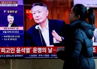 a person walks in front of a tv screen broadcasting a news report on the sentencing trial of south korean former president yoon suk yeol s insurrection case stemming from his short lived declaration of martial law in december 2024 in seoul south korea february 19 2026 photo reuters a person walks in front of a tv screen broadcasting a news report on the sentencing trial of south korean former president yoon suk yeol s insurrection case stemming from his short lived declaration of martial law in december 2024 in seoul south korea february 19 2026 photo reuters