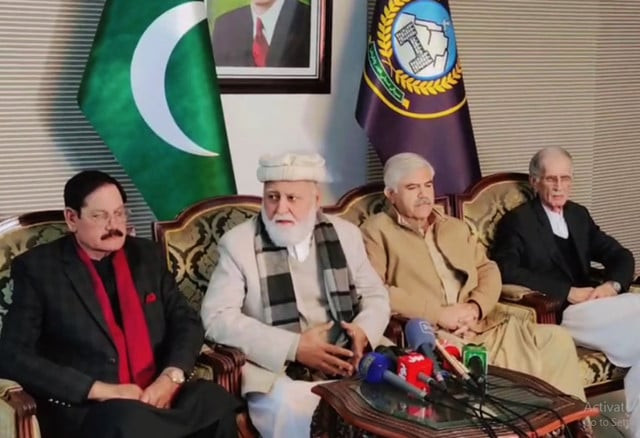 k p chief minister mahmood khan and opposition leader akram durrani addressing press conference screengrab k p chief minister mahmood khan and opposition leader akram durrani addressing press conference screengrab