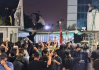 protesters gather outside the kuwaiti consulate after rockets fired from the direction of kuwait hit a house in khor al zubair basra iraq photo reuters