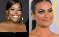 amber riley unfollows glee co stars after lea michele reunion sparks backlash