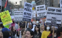 thousands rally in la against trump s immigration policies during grammy weekend