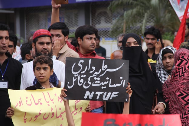 workers from different industries congregated outside the karachi press club to fight for their rights photo ayesha mir express