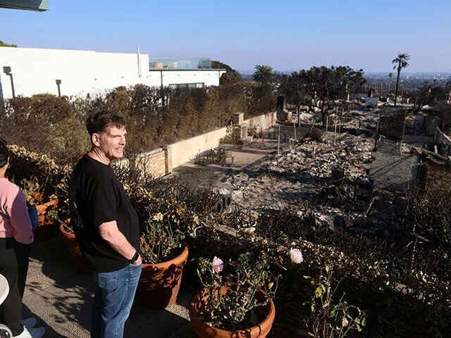 greg and helen levin look at their undamaged home in the palisades for the first time in los angeles california on january 18 photo reuters greg and helen levin look at their undamaged home in the palisades for the first time in los angeles california on january 18 photo reuters