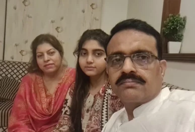 dsp muhammad usman haider is seen in a photograph with his slain wife and daughter photo express