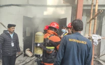 two arrested in lahore hotel fire case