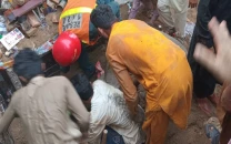rescue operation underway after roof collapse traps at least eight children in lahore