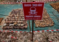 old landmines that thailand says were detonated and recovered near the disputed border between thailand and cambodia are displayed during a media visit organized by the royal thai army following a ceasefire between cambodia and thailand in surin province thailand august 20 2025 photo reuters