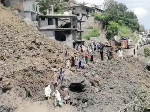locals and tourists cross a treacherous mountainous road amid landsliding in murree photos express locals and tourists cross a treacherous mountainous road amid landsliding in murree photos express