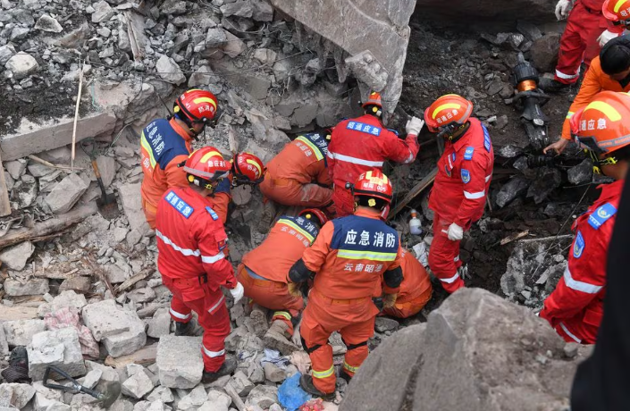 rescue workers search for survivors in the debris after a landslide hit zhenxiong county in zhaotong yunnan province china january 22 2024 china daily via reuters