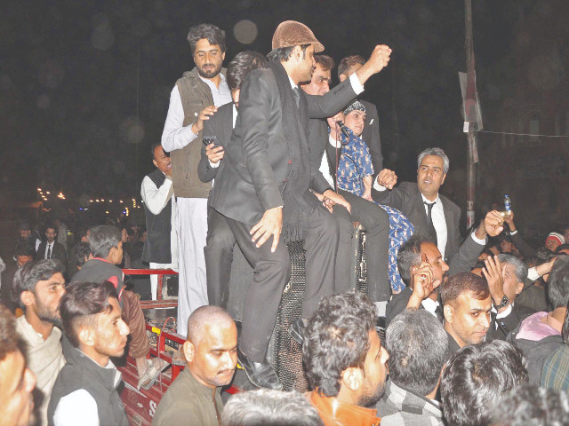 members of the legal fraternity stage a sit in at the hyderabad bypass against police for impounding the car of an advocate photo ppi