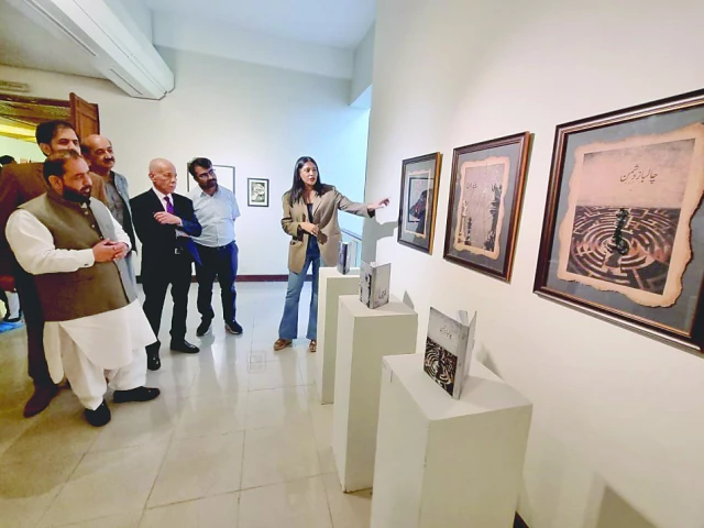 federal culture minister aurangzeb khichi and others admire art pieces on display at the shared distances exhibition at the pnca in islamabad photos app federal culture minister aurangzeb khichi and others admire art pieces on display at the shared distances exhibition at the pnca in islamabad photos app