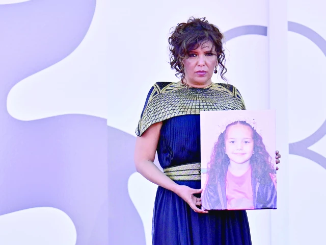 tunisian director kaouther ben hania holds a portrait of late palestinian girl hind rajab during the red carpet for the movie the voice of hind rajab presented in competition at the 82nd international venice film festival at venice lido photo afp tunisian director kaouther ben hania holds a portrait of late palestinian girl hind rajab during the red carpet for the movie the voice of hind rajab presented in competition at the 82nd international venice film festival at venice lido photo afp