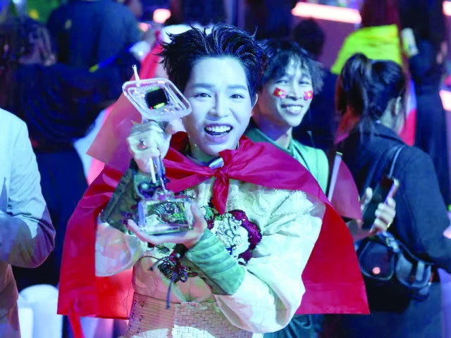 duc phuc who represents vietnam holds the trophy after winning the intervision international music contest 2025 in moscow photo reuters duc phuc who represents vietnam holds the trophy after winning the intervision international music contest 2025 in moscow photo reuters
