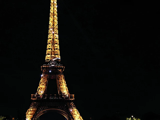 models present creations by saint laurent in front of the eiffel tower as part of the paris fashion week photo afp