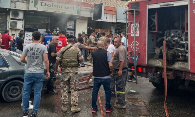 people and first responders gather at the scene of a reported device explosion in saida in southern lebanon on september 18 2024 photo afp people and first responders gather at the scene of a reported device explosion in saida in southern lebanon on september 18 2024 photo afp