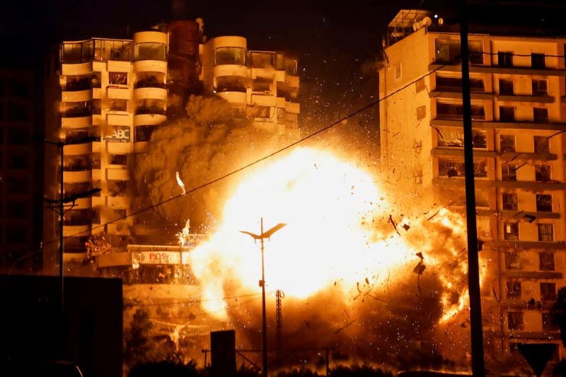 a view shows the moment of an israeli strike on a building amid the ongoing hostilities between hezollah and israeli forces in the chiyah district of beirut s southern suburbs lebanon november 25 2024 photo reuters