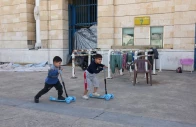 children play outside camille chamoun sports city stadium turned into a temporary shelter in beirut lebanon may 8 2026 reuters