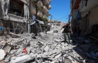 a man walks on rubble at the site an israeli strike in tyre lebanon june 12 2026 photo reuters
