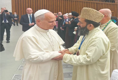 maulana khabir azad shakes hands with pope leo during a meeting in the vatican city photo express