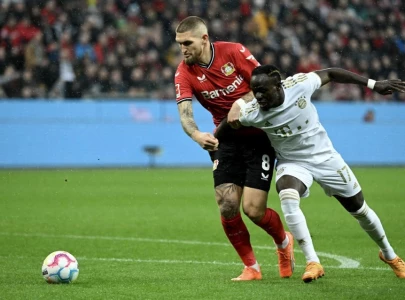 leverkusen shock bayern to keep dortmund top
