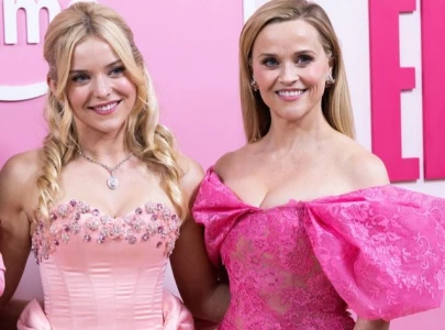 reese witherspoon joins lexi minetree to celebrate elle premiere in new york
