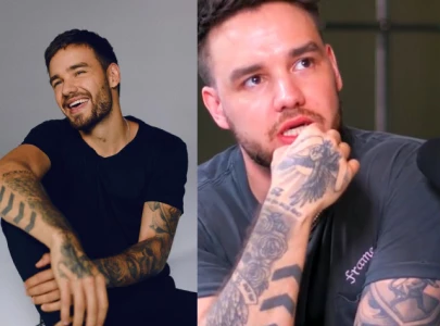 liam payne s tattoos explored as fans spot clouds resembling his iconic arrow ink