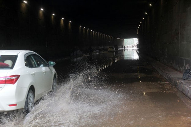 many cars were stuck in the water that accumulated in the liaquatabad underpass on friday morning photo athar khan express many cars were stuck in the water that accumulated in the liaquatabad underpass on friday morning photo athar khan express